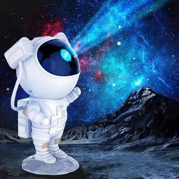 Нічник лазерний проектор галактики Астронавт з зіркою LED зоряне небо Astronaut (з пультом) Sp1010 фото